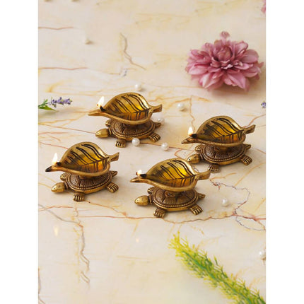 eCraftIndia 4 Pieces Beige Tortoise Statue Leaf Design Diyas