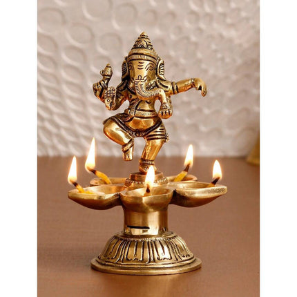 eCraftIndia Gold-Toned Handcrafted Dancing Lord Ganesha Showpiece With Diya