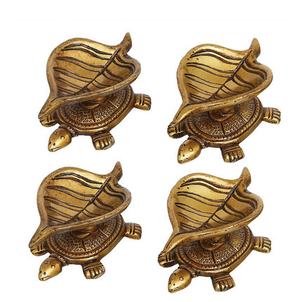eCraftIndia 4 Pieces Beige Tortoise Statue Leaf Design Diyas