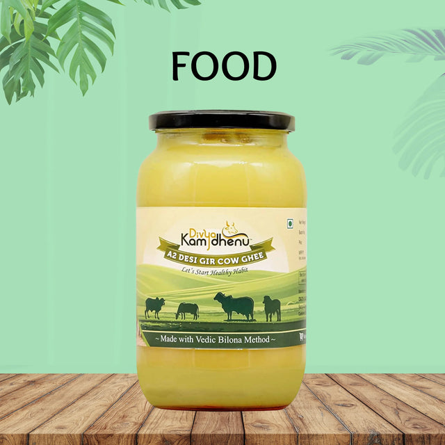 Divya Kamdhenu A2 Desi Gir Cow Ghee jar on wooden table, green background, Shoppiearth UK food product