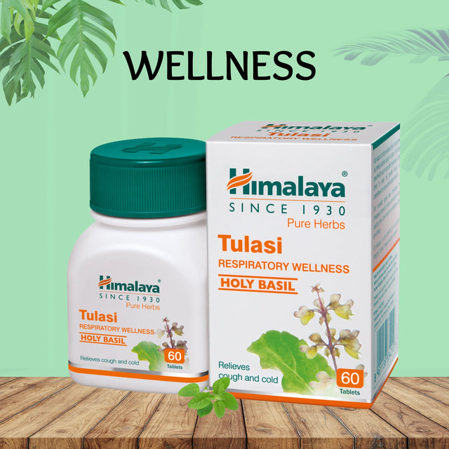 Himalaya Tulasi Holy Basil tablets for respiratory wellness, 60 count, on wood with green leaf background at Shoppiearth UK.