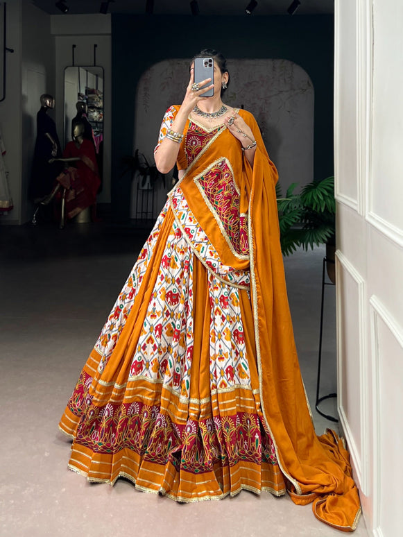 Lorenvalley Fashion Mustard Rayon with Printed Silk Patola Print with Gamthi Work and Lace Touch Up Lehenga Choli with Dupatta
