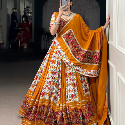 Lorenvalley Fashion Mustard Rayon with Printed Silk Patola Print with Gamthi Work and Lace Touch Up Lehenga Choli with Dupatta
