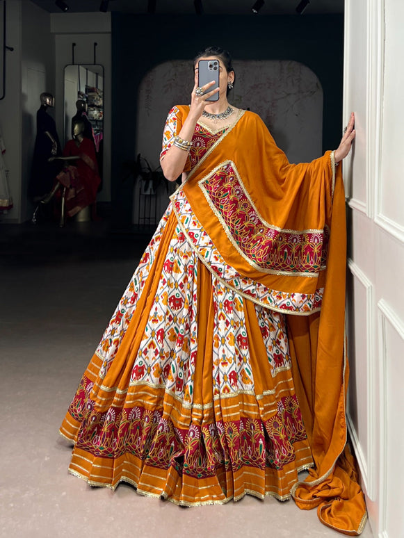 Lorenvalley Fashion Mustard Rayon with Printed Silk Patola Print with Gamthi Work and Lace Touch Up Lehenga Choli with Dupatta