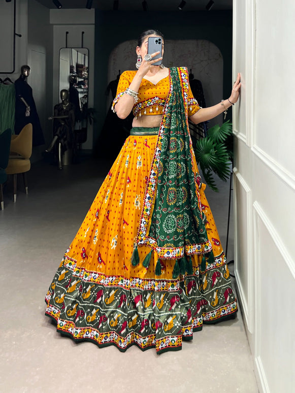 Lorenvalley Mustard Tussar Silk Patola Print with Gamthi Work Lace and Foil Work Lehenga Choli with Dupatta