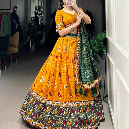 Lorenvalley Mustard Tussar Silk Patola Print with Gamthi Work Lace and Foil Work Lehenga Choli with Dupatta