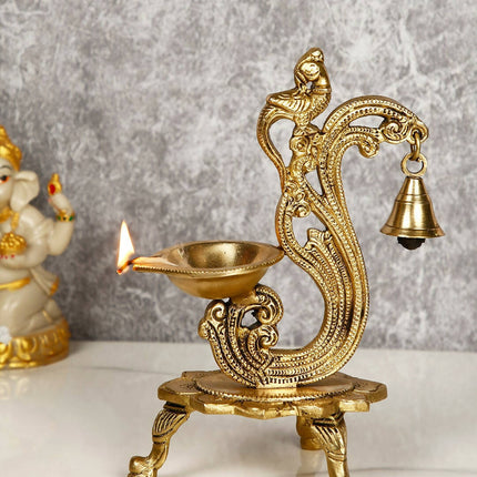 CraftVatika Gold-Toned Brass Handmade Decorative Peacock Design Diya with Bell & Stand