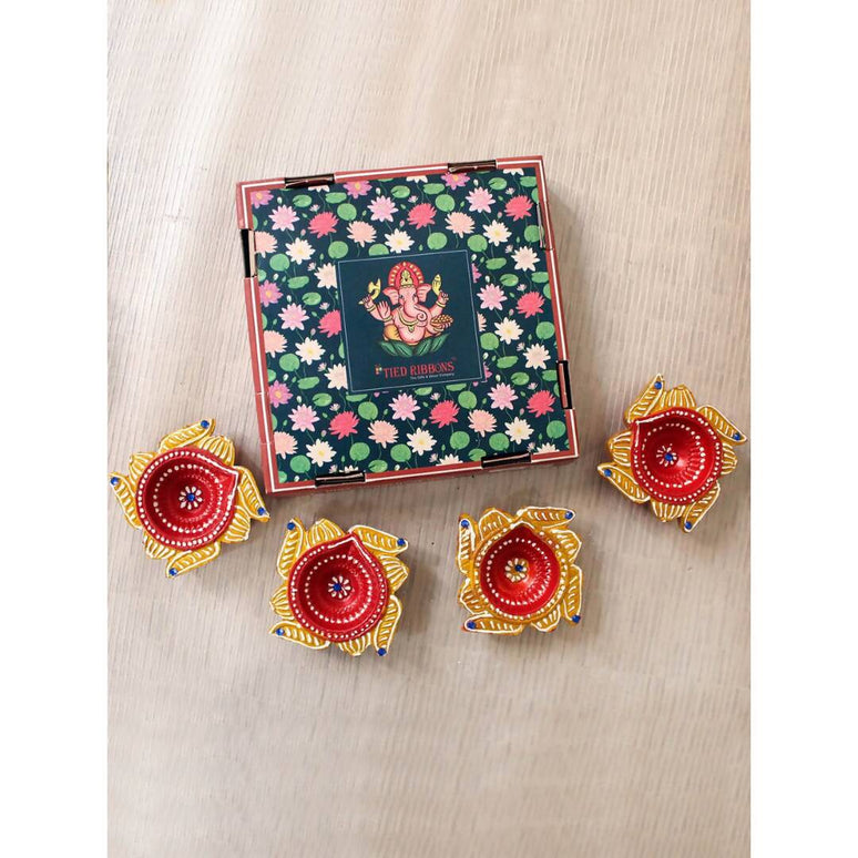 Tied Ribbons Set Of 4 Yellow & Red Printed Terracotta Diyas