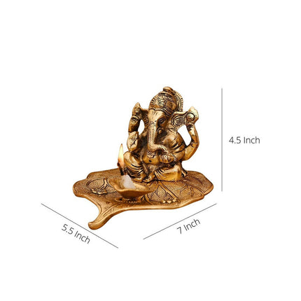 CraftVatika Gold Toned Aluminium Ganesh with Diya Idol