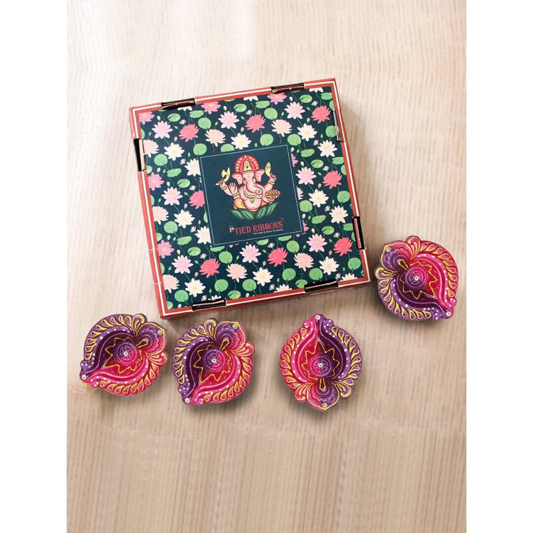 Tied Ribbons Set of 4 Red & Violet Textured Terracotta Diyas