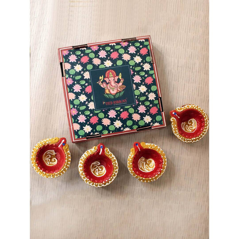 Tied Ribbons Set Of 4 Terracotta Diyas
