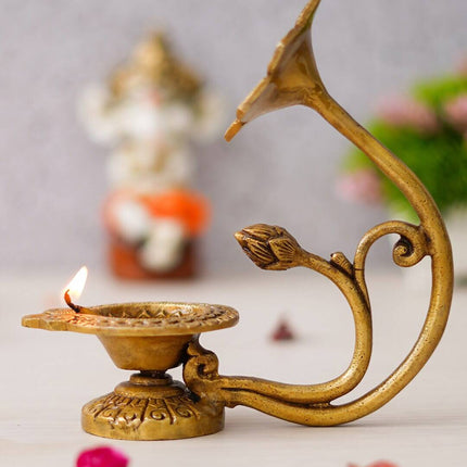 eCraftIndia Gold Toned Flower Shaped Brass Diya With Floral Handle