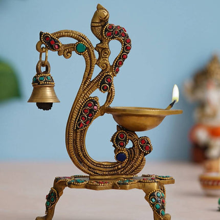 eCraftIndia Gold Toned Peacock Shaped Traditional Brass Diya With Bell & Stand