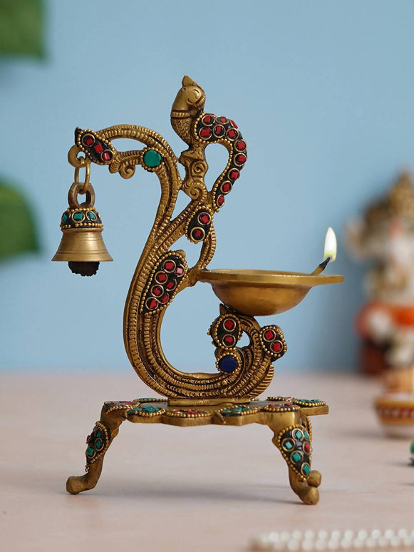 eCraftIndia Gold Toned Peacock Shaped Traditional Brass Diya With Bell & Stand