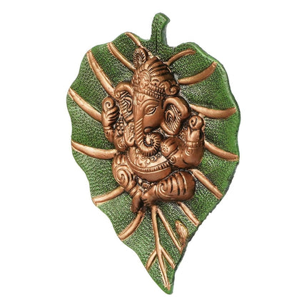 eCraftIndia Metal Golden Lord Ganesha On Green Leaf Wall Hanging Sculpture